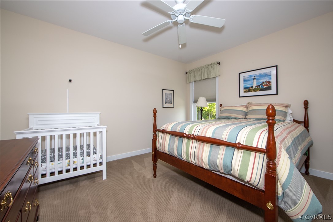 163 Button Bush Road Richmond, VA 23238 - Photo 33 of 46 a bed room with a bed and a window