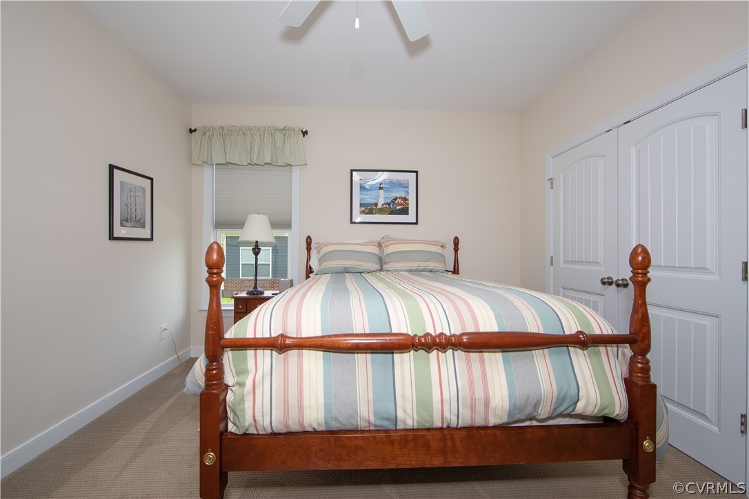 163 Button Bush Road Richmond, VA 23238 - Photo 34 of 46 a bedroom with a bed and a dresser