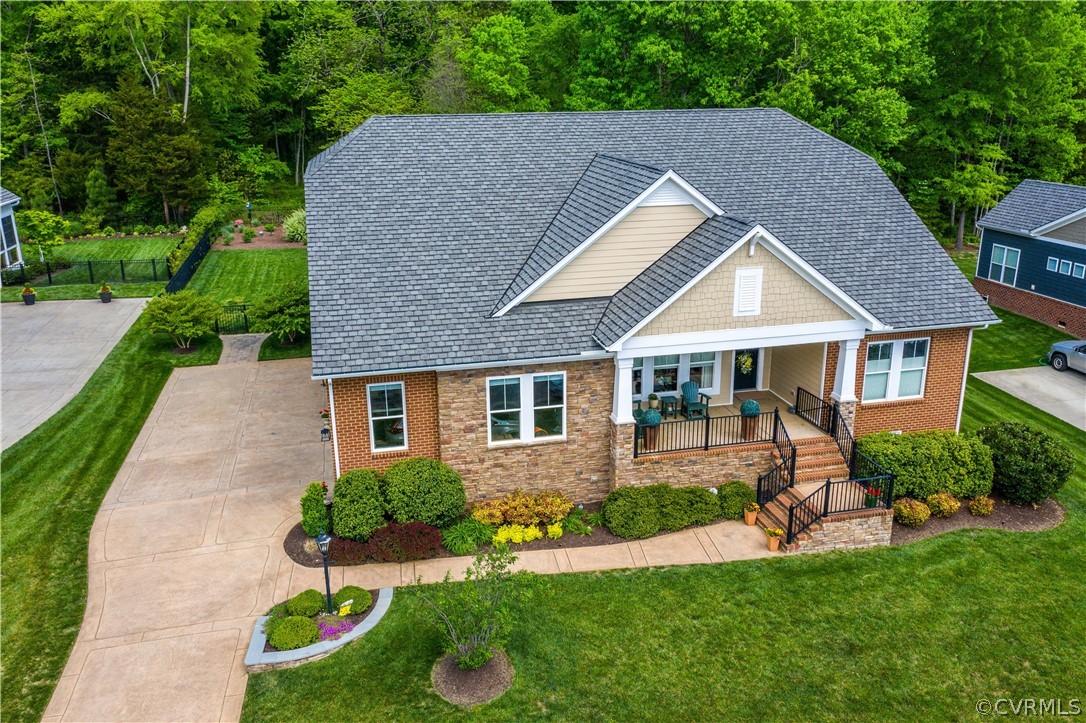 163 Button Bush Road Richmond, VA 23238 - Photo 44 of 46 a aerial view of a house with a yard table and chairs