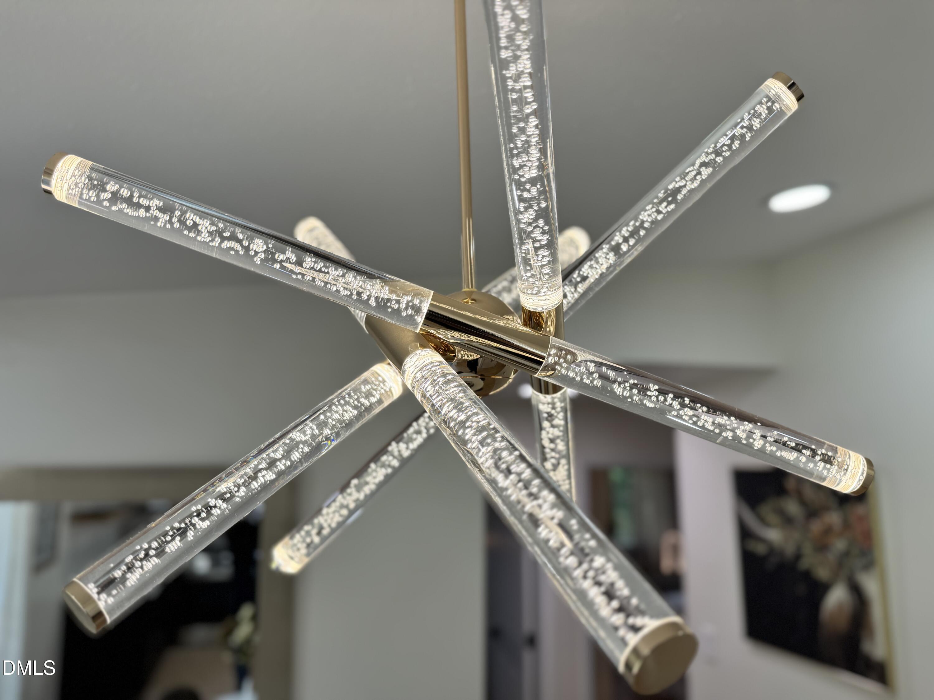 851 Hadley Road Raleigh, NC 27610 - Photo 13 of 46 a very nice looking hallway with lots of frames on wall and a chandelier