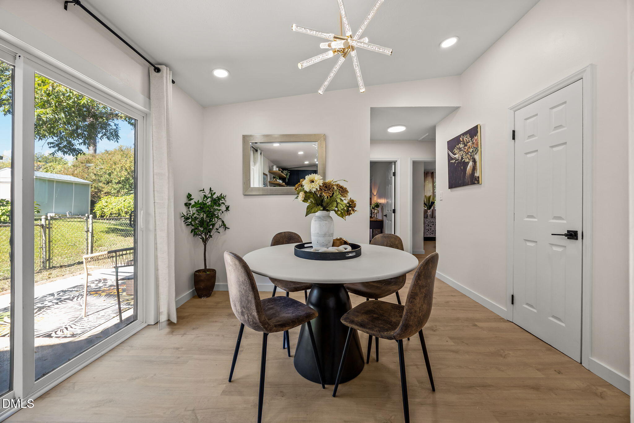 851 Hadley Road Raleigh, NC 27610 - Photo 23 of 46 a view of a dining room with furniture window and outside view
