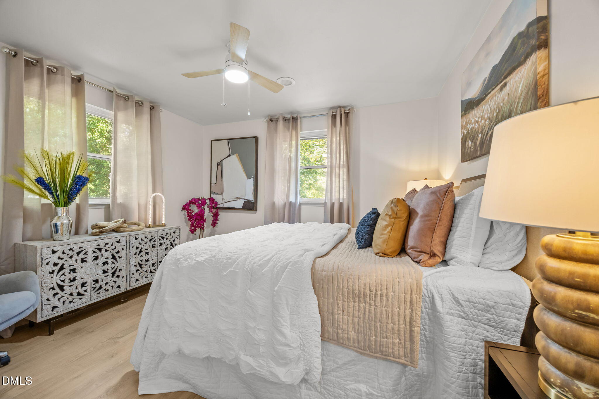 851 Hadley Road Raleigh, NC 27610 - Photo 26 of 46 a bedroom with a bed and a couch
