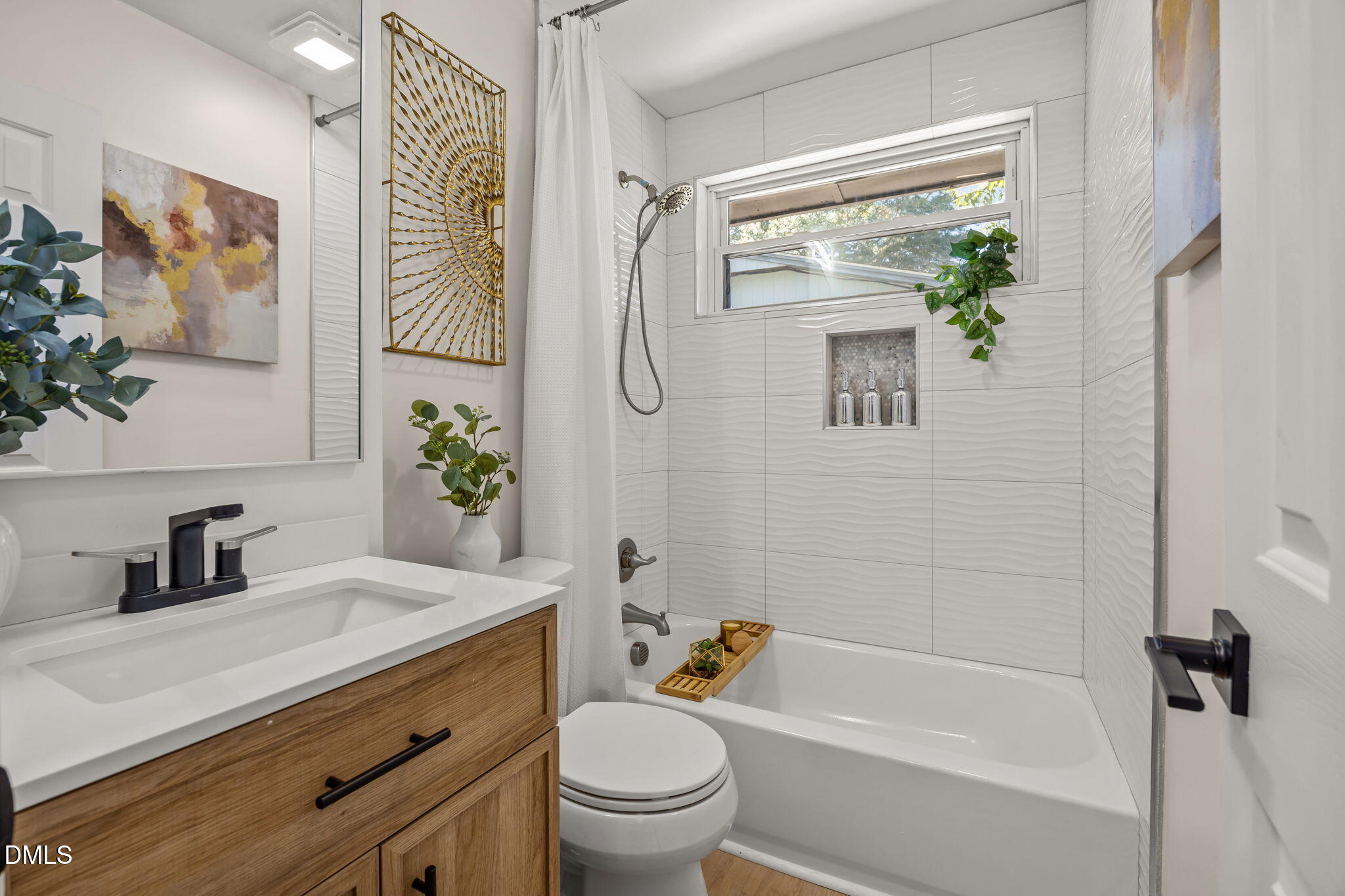 851 Hadley Road Raleigh, NC 27610 - Photo 36 of 46 a bathroom with a granite countertop sink a toilet and shower