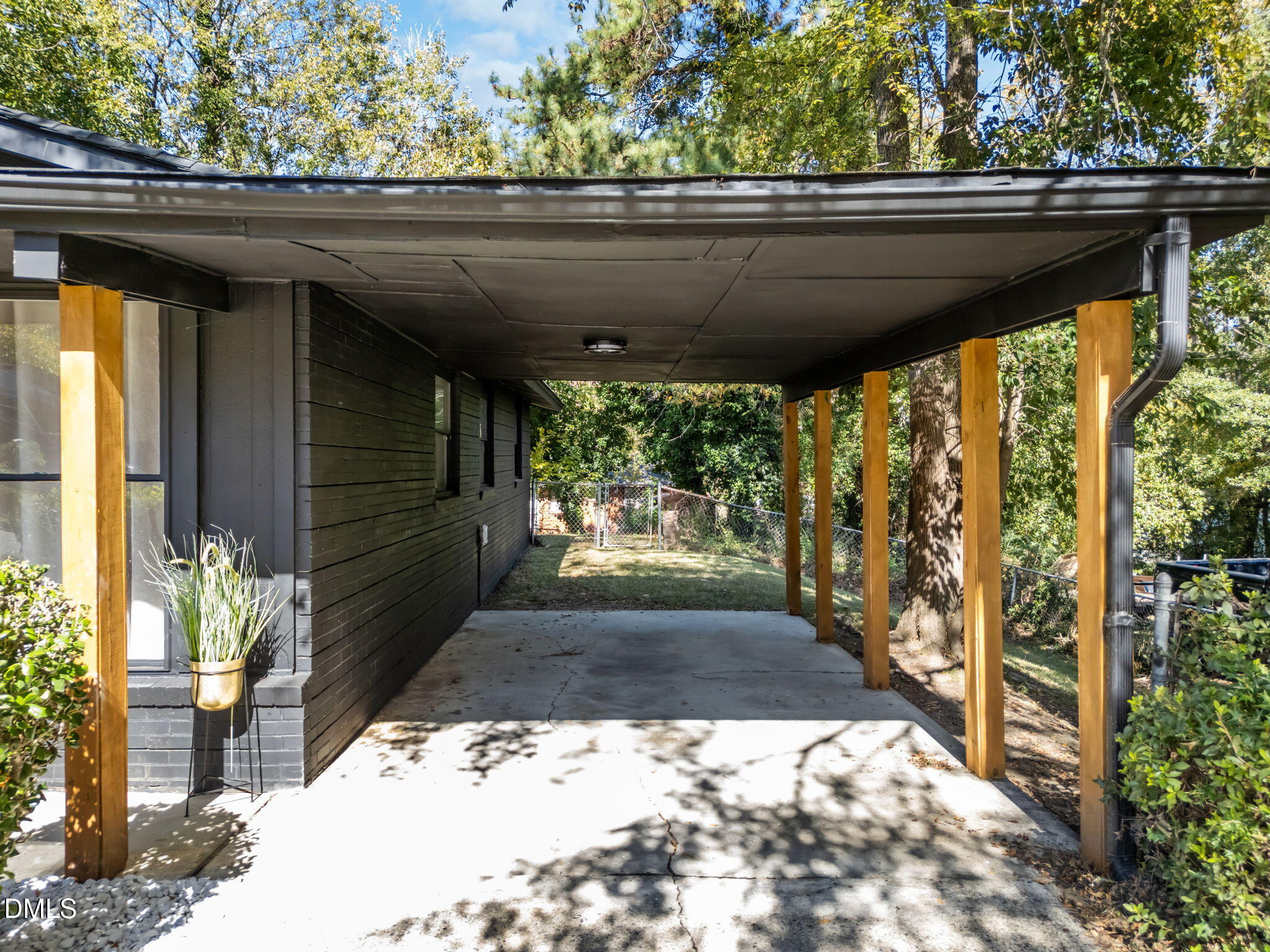 851 Hadley Road Raleigh, NC 27610 - Photo 39 of 46 a view of backyard with a patio