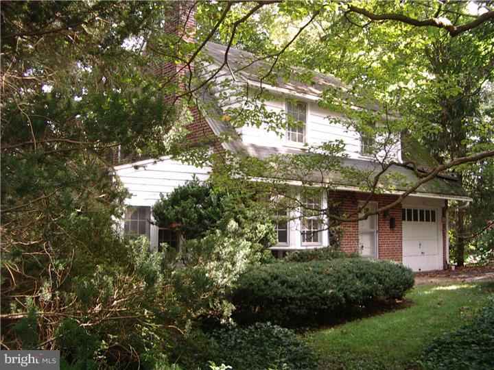 10 Valley View Road Rose Valley, PA 19063 - Photo 1 of 14 a front view of a house with a yard