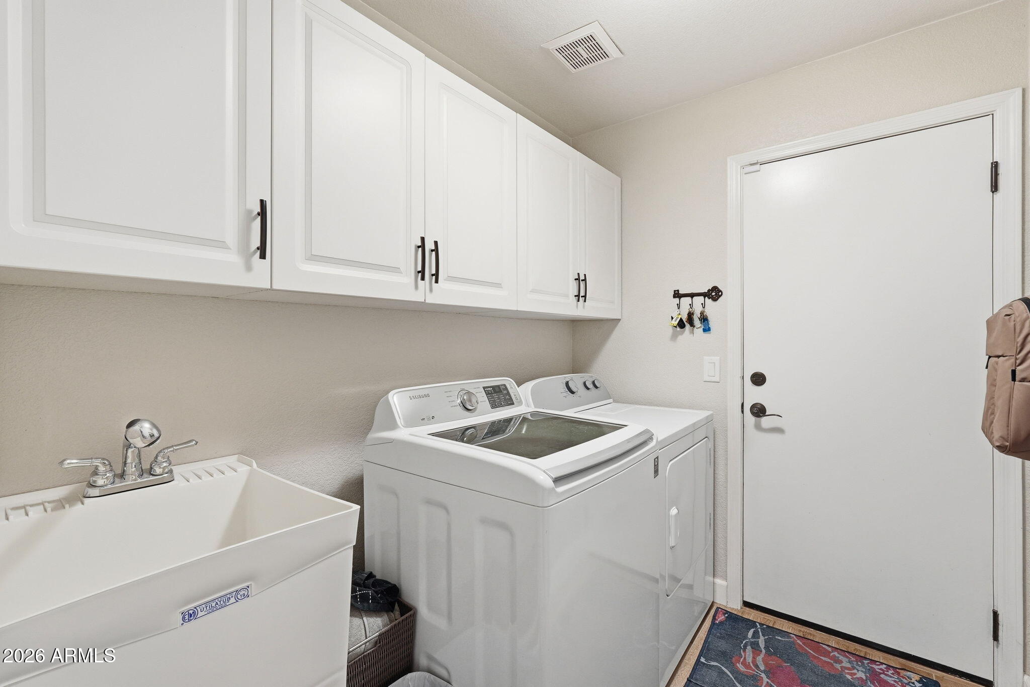 3271 East Santa Fe Lane Gilbert, AZ 85297 - Photo 31 of 39 LAUNDRY ROOM