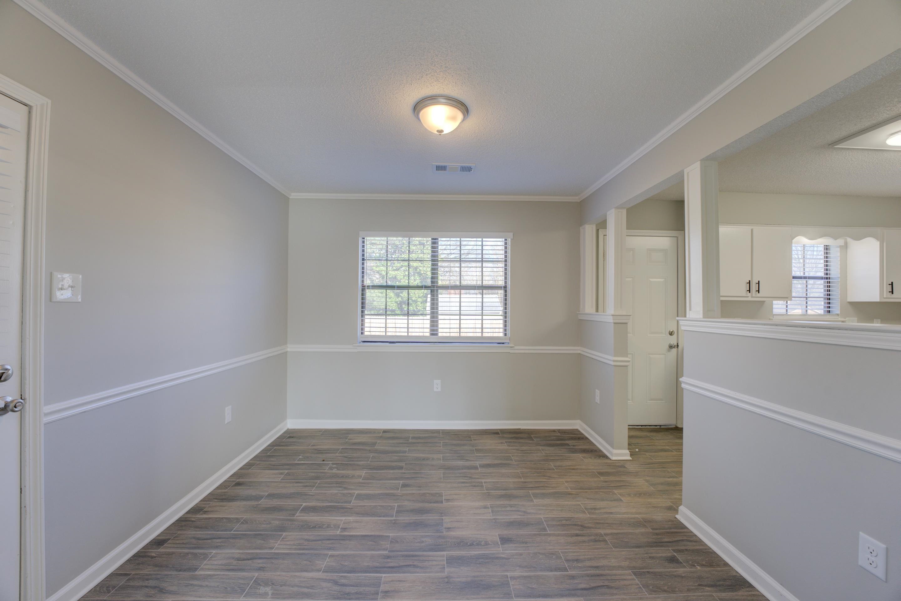 3808 Haynes Road Bartlett, TN 38133 - Photo 13 of 24 Unfurnished room with crown molding and dark wood-type flooring