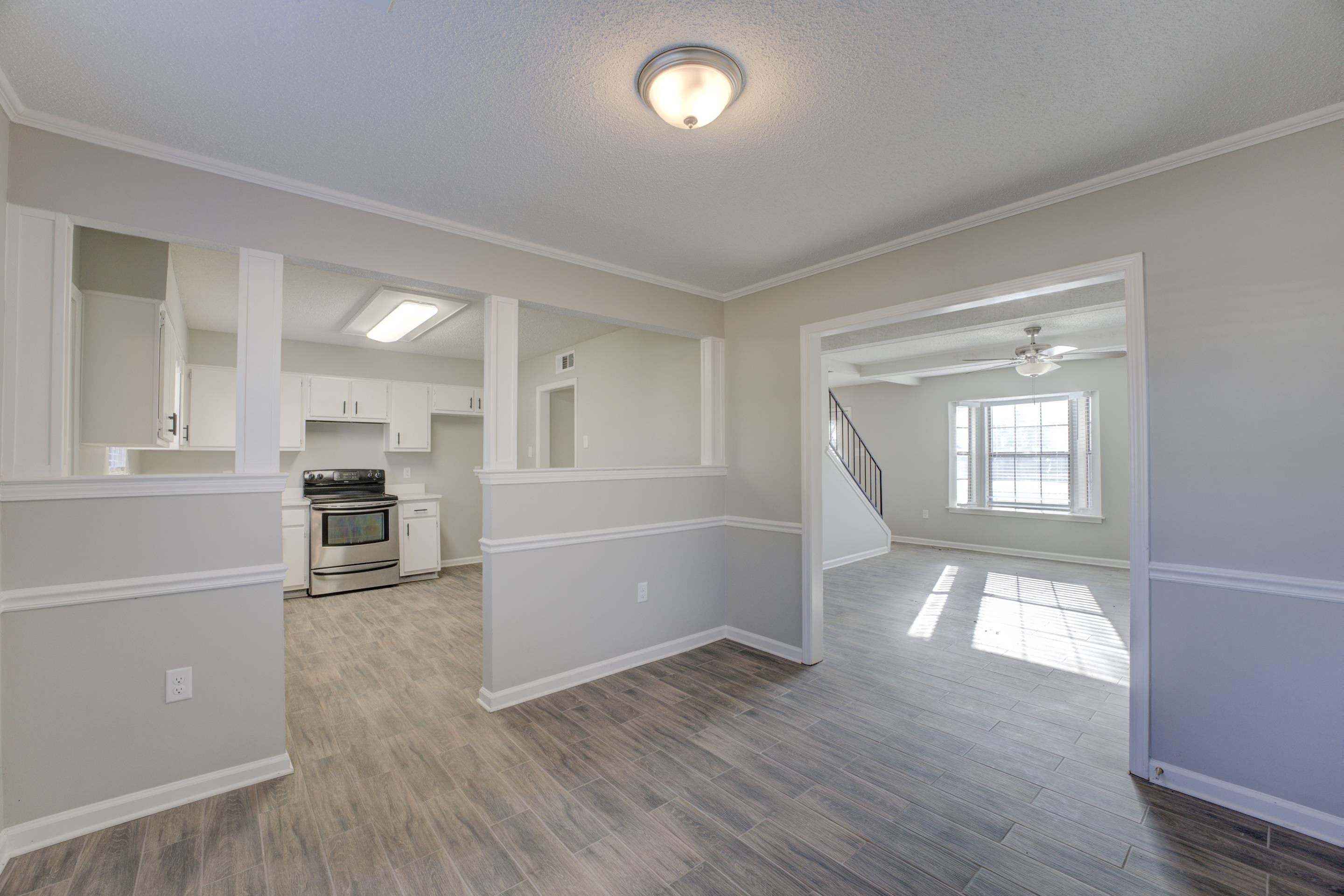 3808 Haynes Road Bartlett, TN 38133 - Photo 16 of 24 Interior space featuring hardwood / wood-style flooring, ornamental molding, and a textured ceiling