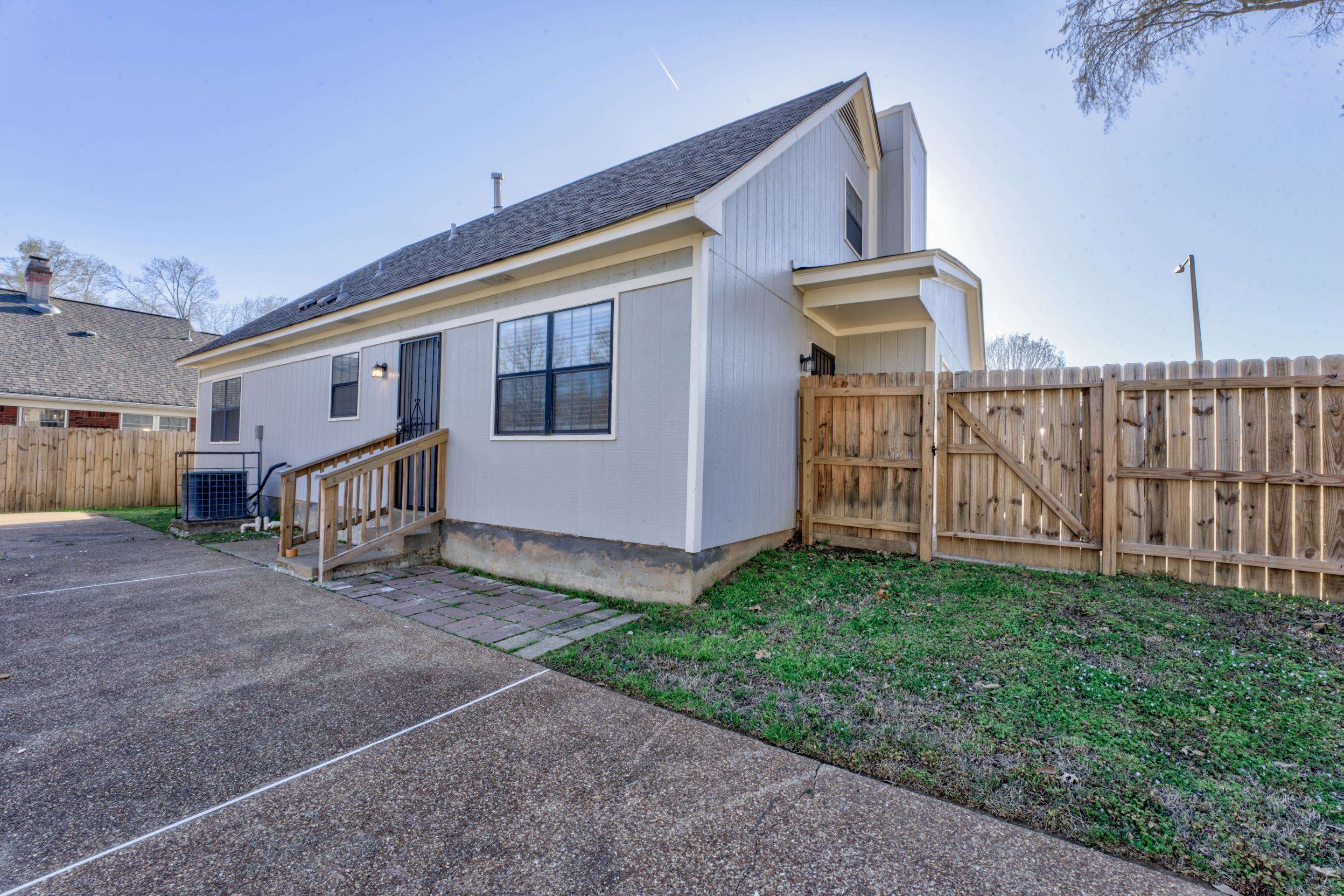 3808 Haynes Road Bartlett, TN 38133 - Photo 6 of 24 Back of house featuring central AC and a patio area