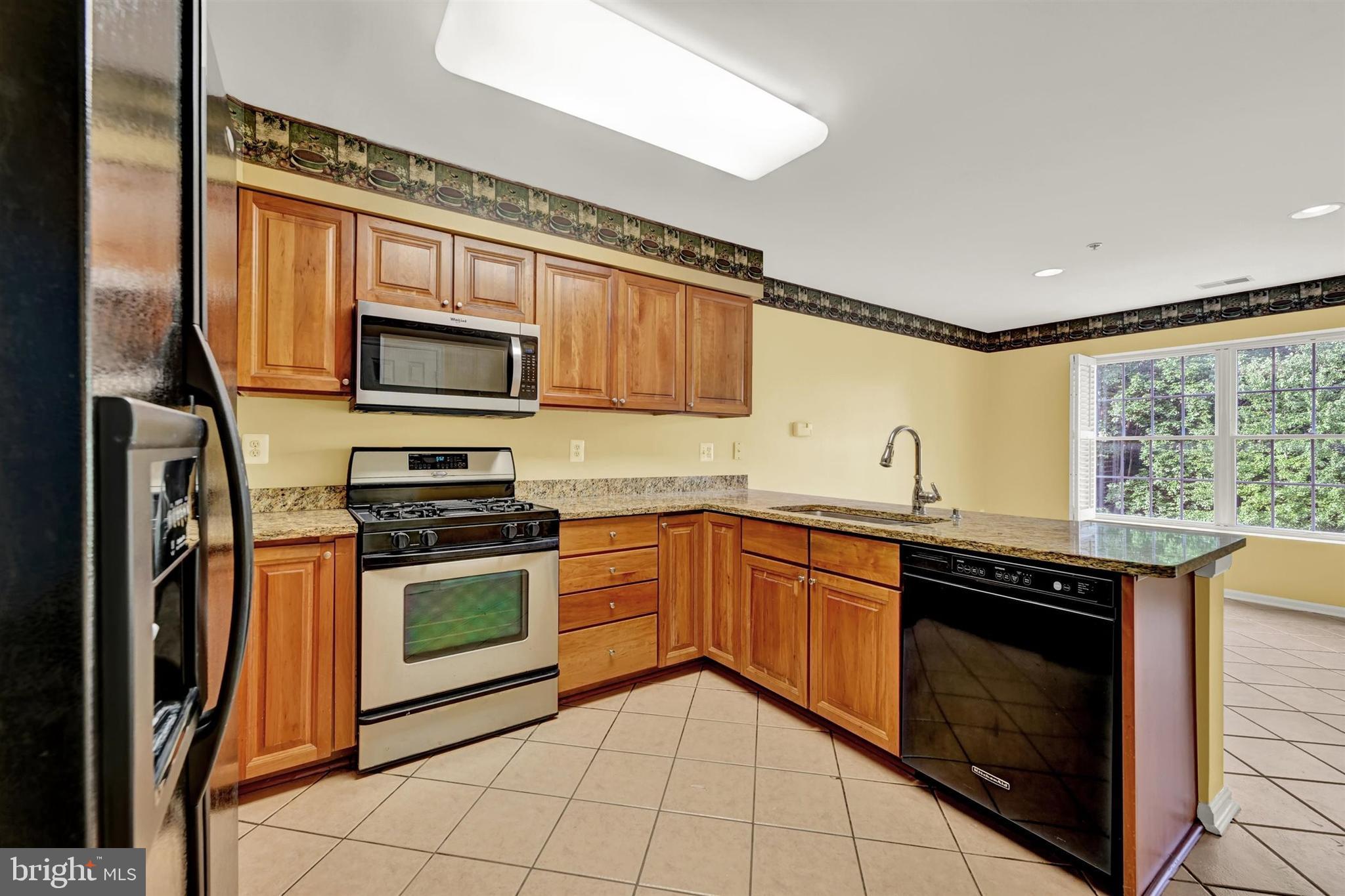 12021 Tralee Road, Unit 402 Lutherville-Timonium, MD 21093 - Photo 12 of 36 Kitchen
