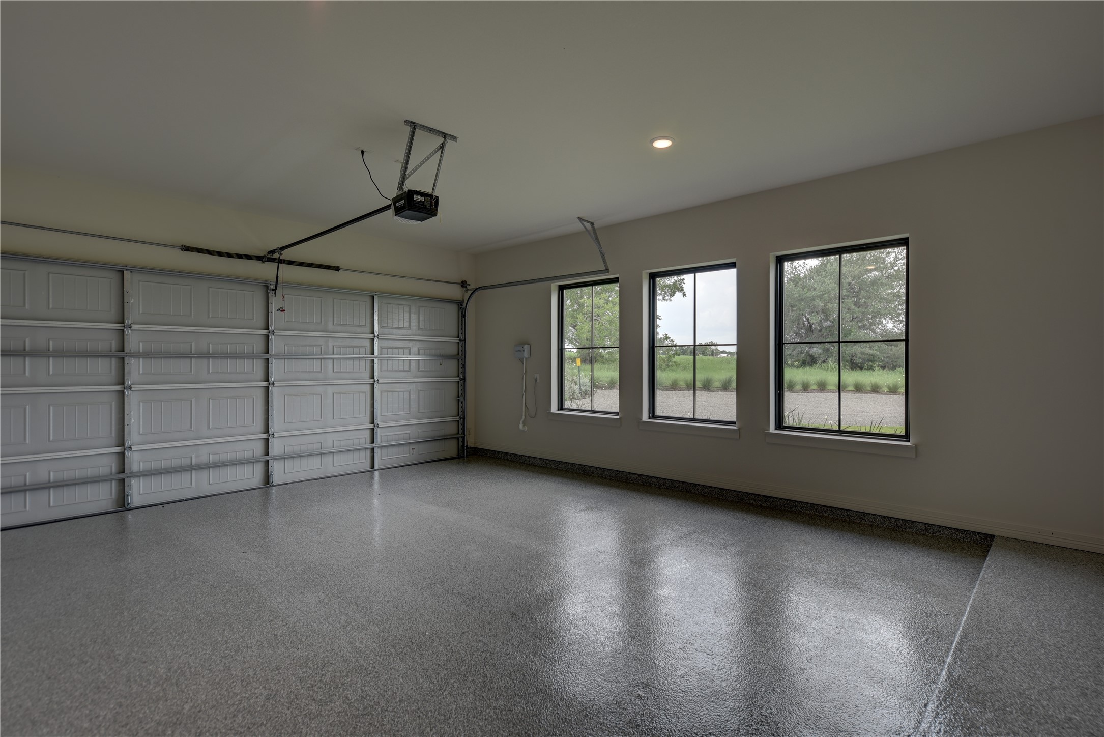 114 Turney Trace Round Top, TX 78954 - Photo 36 of 44 a view of a livingroom with an empty space and window
