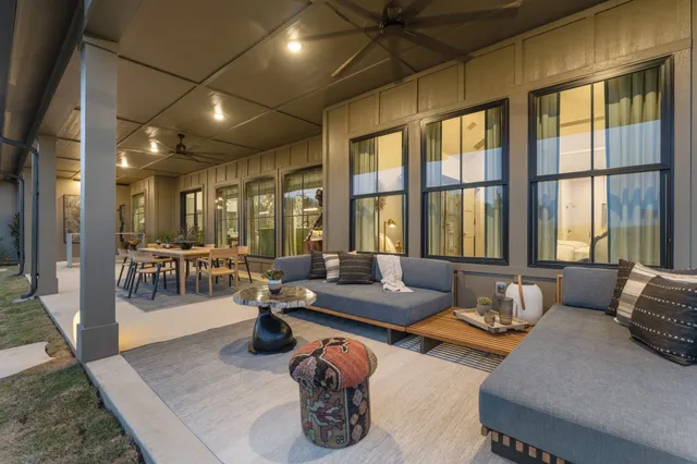 a view of a patio with swimming pool