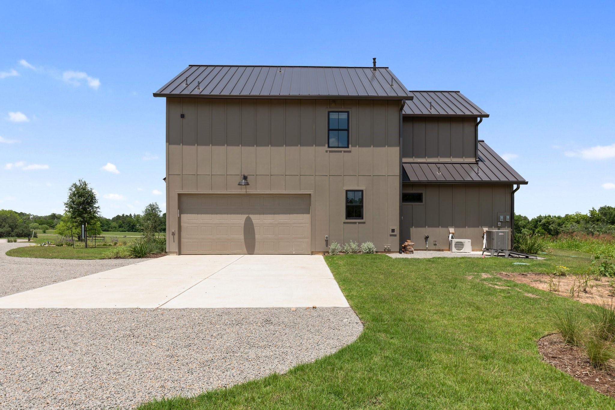 114 Turney Trace Round Top, TX 78954 - Photo 42 of 44 a front view of a house with a yard