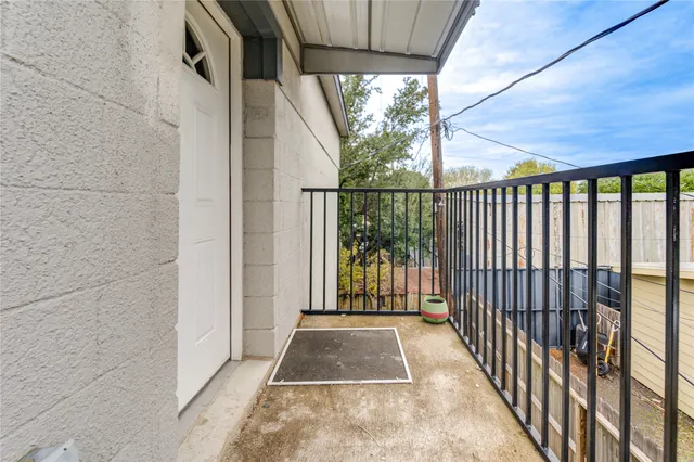 a front view of a house with parking space