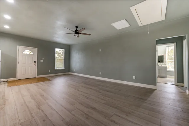 a view of a kitchen with a sink and a stove top oven
