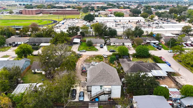 a bathroom with a sink toilet a mirror and shower