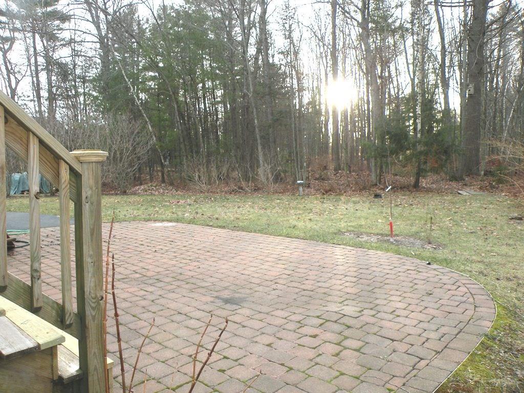 46 Roaring Brook Road Portland, ME 04103 - Photo 29 of 31 Backyard lawn and patio