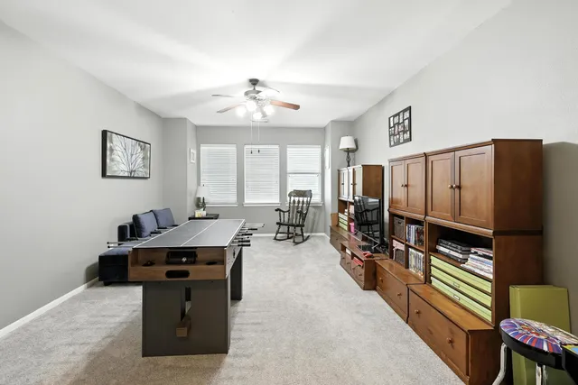 a view of a workspace with furniture