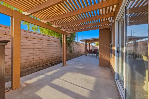 a view of a porch with furniture