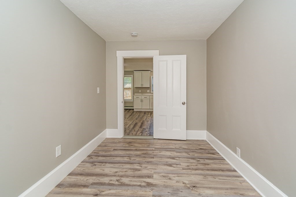 48 Washington Street Lawrence, MA 01841 - Photo 35 of 38 a view of a room with wooden floor