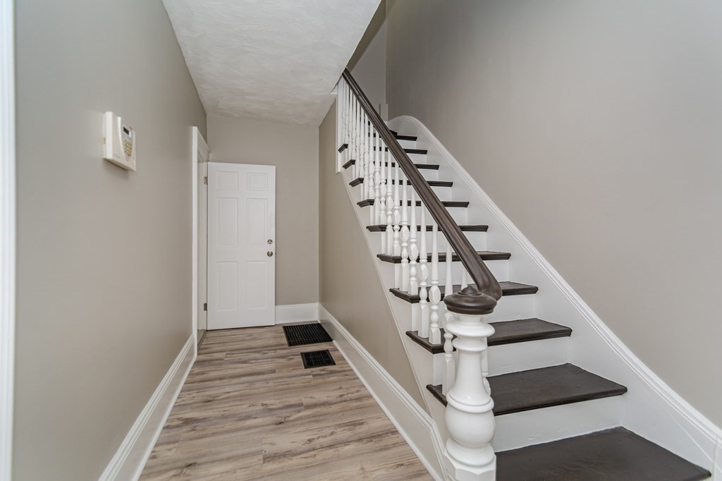 48 Washington Street Lawrence, MA 01841 - Photo 6 of 38 a view of entryway with wooden floor