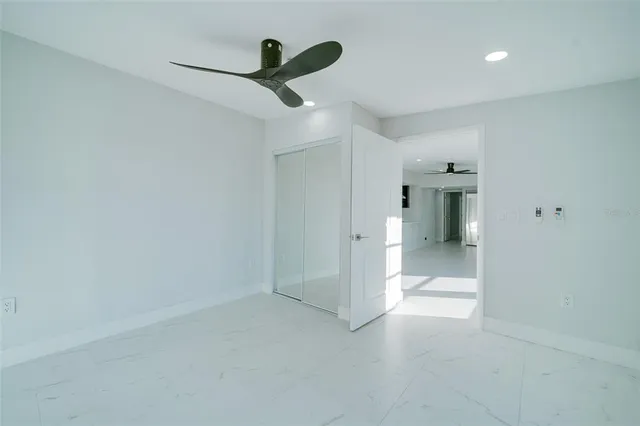 a bathroom with a sink toilet and a mirror