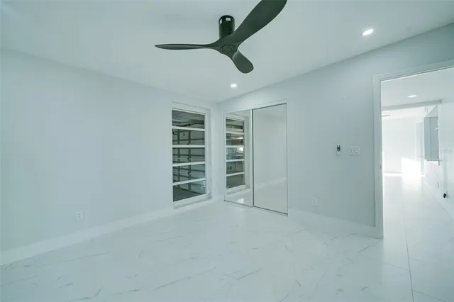 a bathroom with a bathtub and a toilet