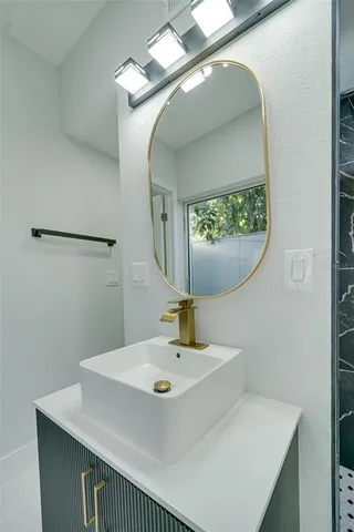 an aerial view of a house with a lake view