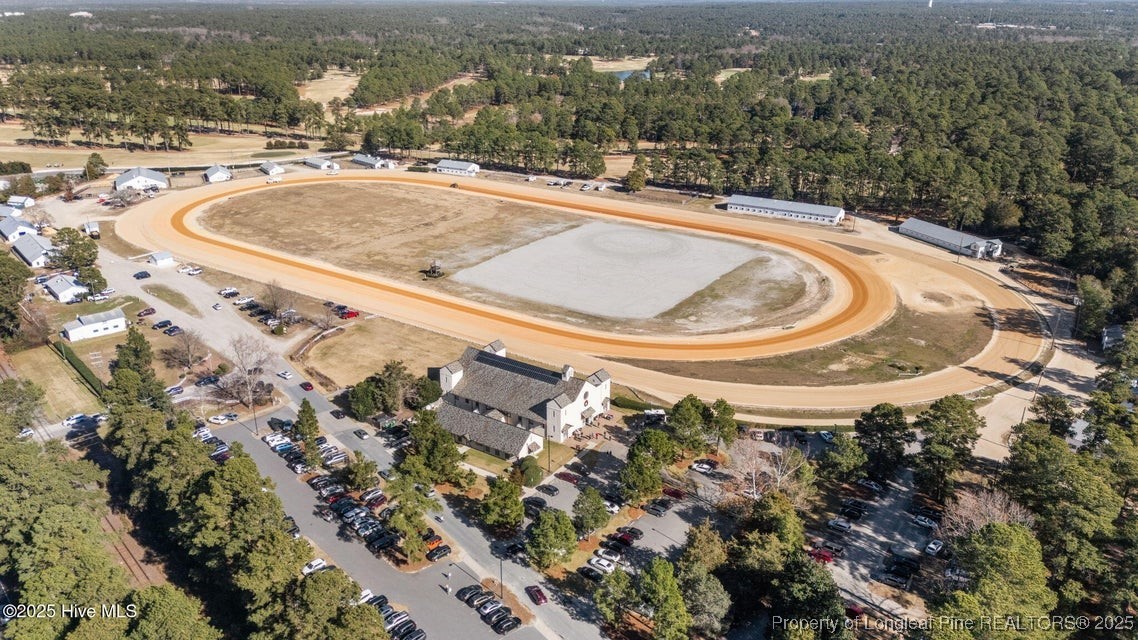 10 Pine Tree Road, Unit 211 Pinehurst, NC 28374 - Photo 31 of 36 an aerial view of residential houses with outdoor space