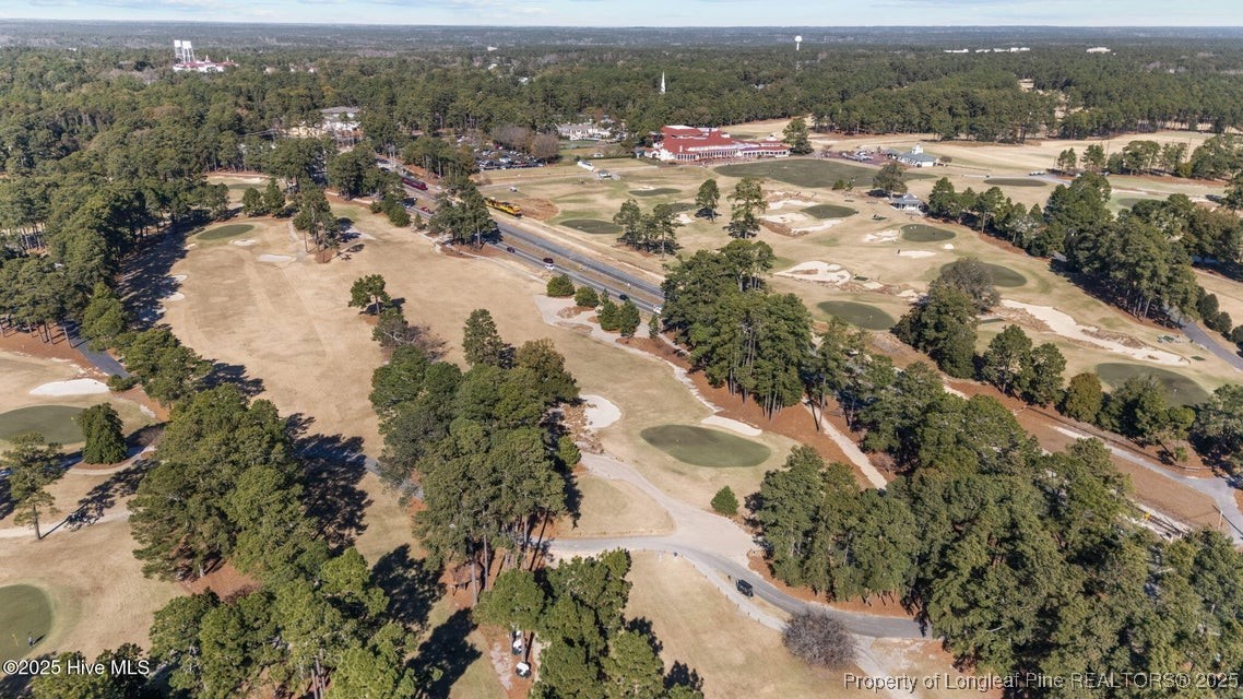 10 Pine Tree Road, Unit 211 Pinehurst, NC 28374 - Photo 35 of 36 an aerial view of residential houses with outdoor space