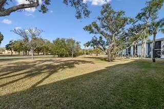 a view of road with yard