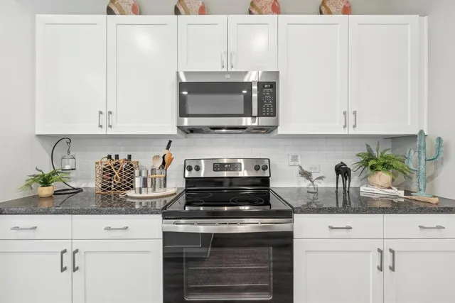 a bedroom with a bed and a closet