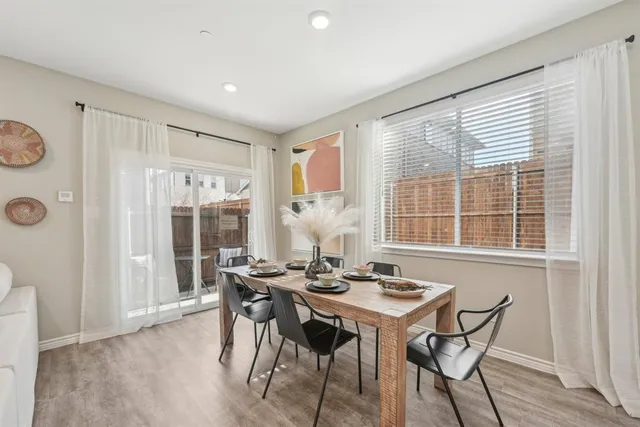 a view of a livingroom with wooden floor
