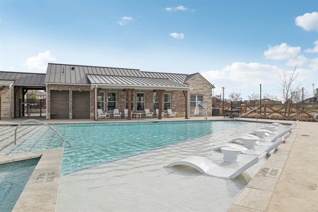 4430 Prairie Crossing, Unit 100 Prosper, TX 75078 - Photo 27 of 34 View of pool with a patio area