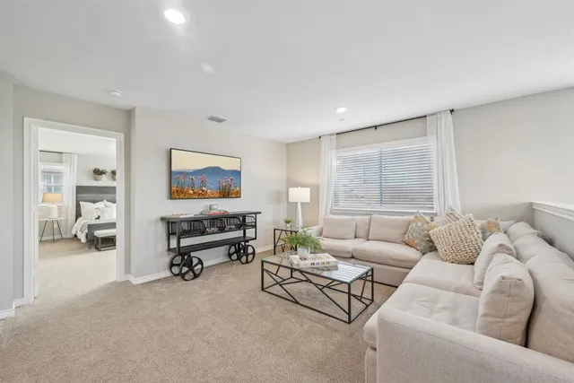 a living room with furniture and a couch
