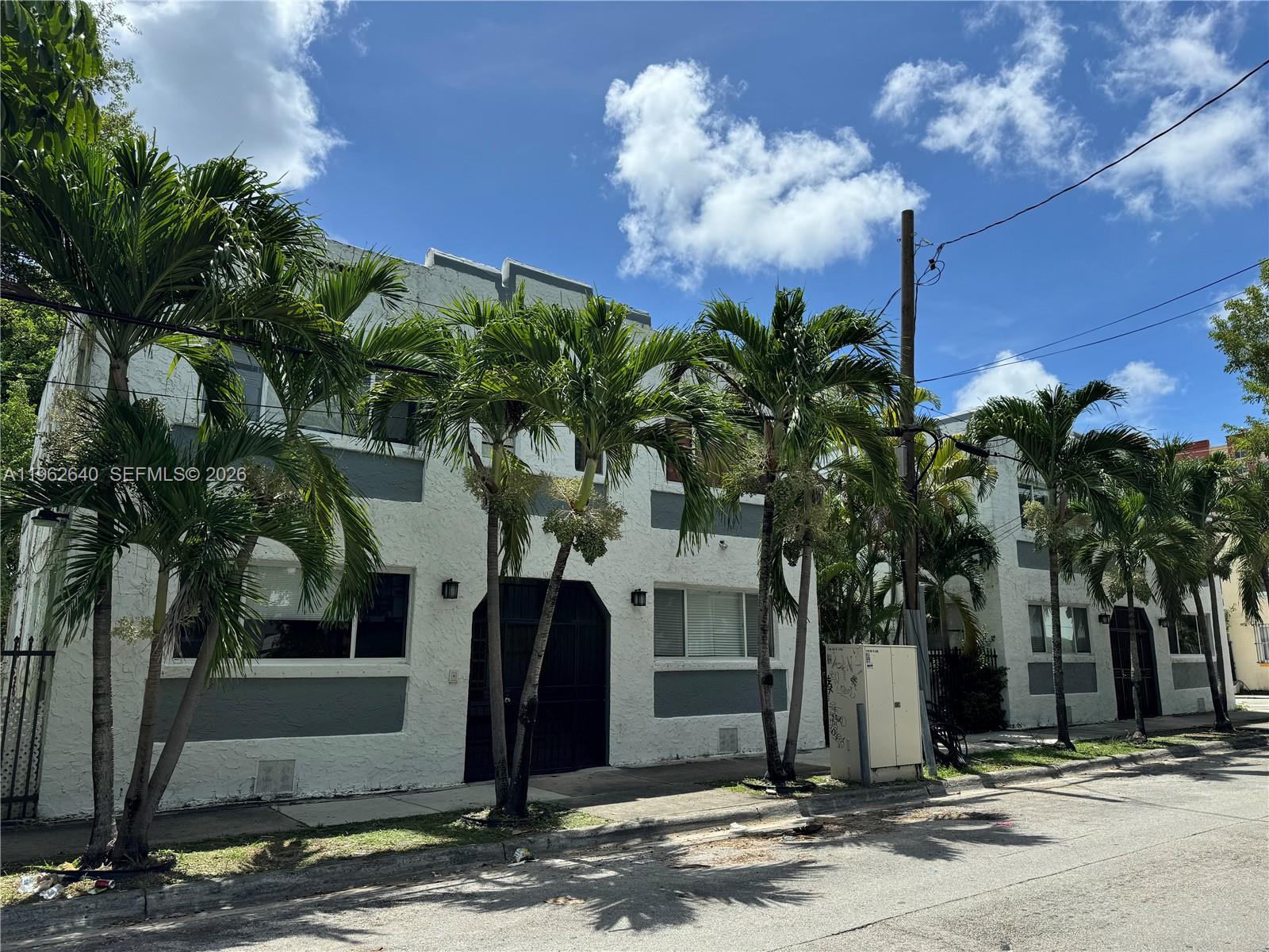103 Northwest 6th Avenue, Unit 2 Miami, FL 33128 - Photo 20 of 20 a front view of a house with garden