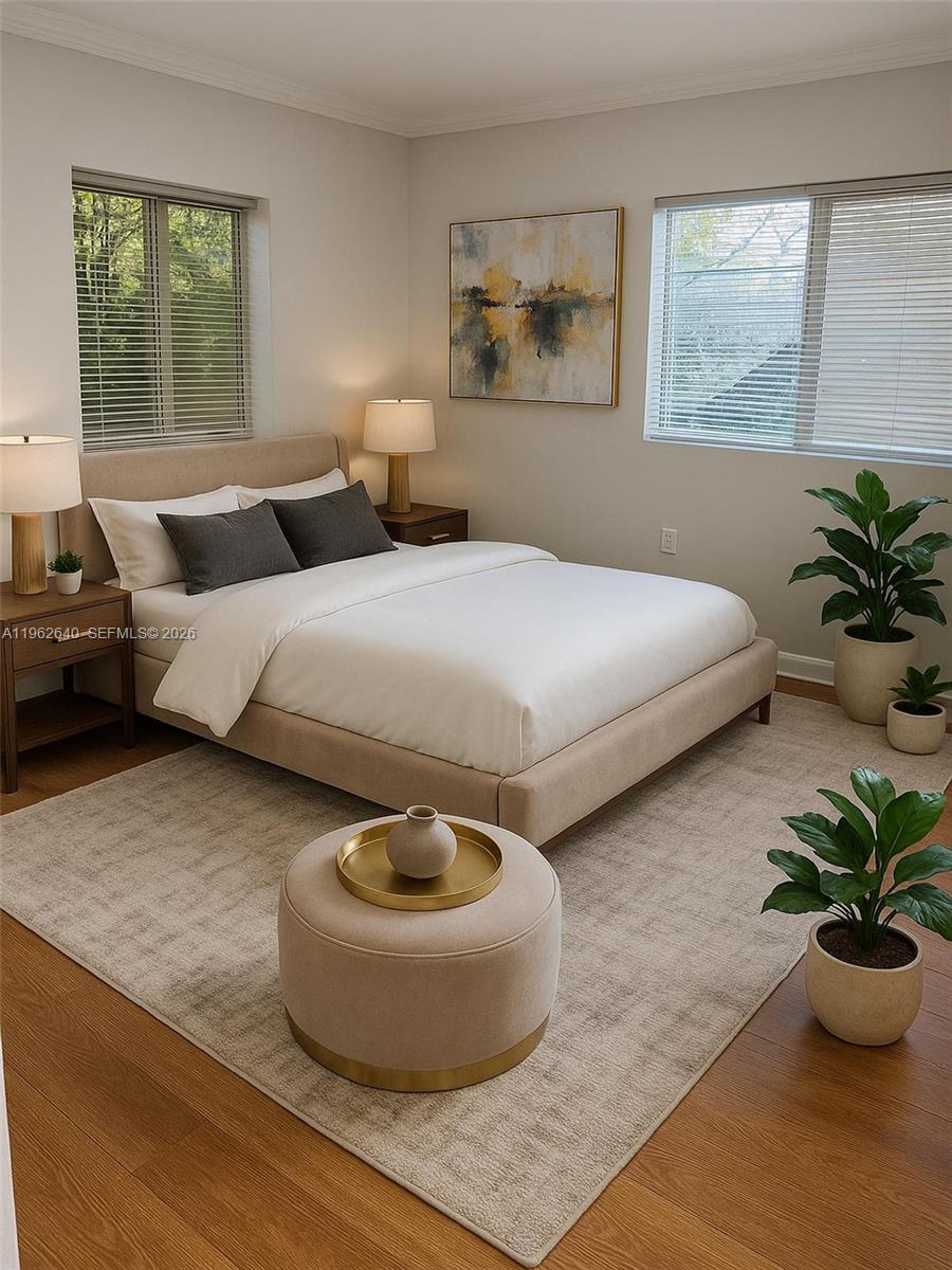 103 Northwest 6th Avenue, Unit 2 Miami, FL 33128 - Photo 3 of 20 a bedroom with bed and window