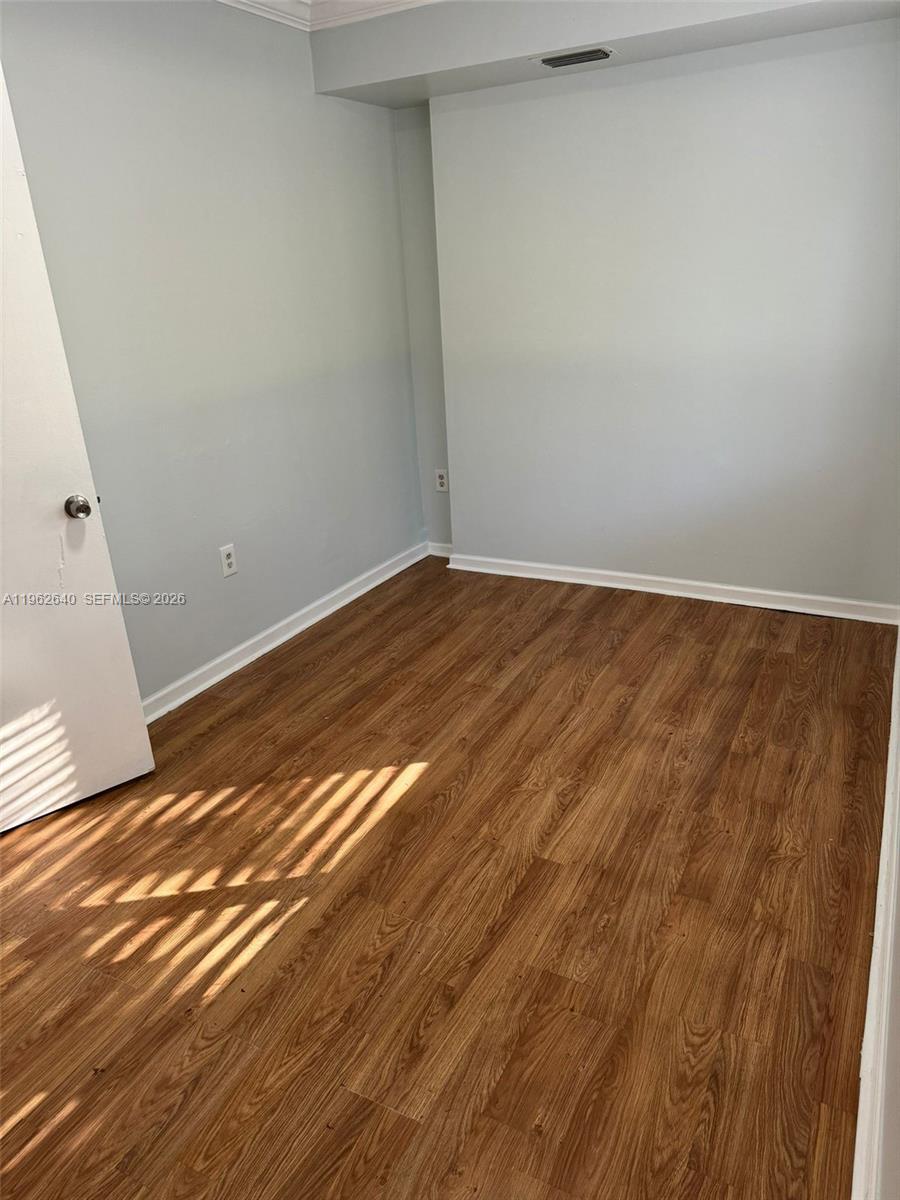 103 Northwest 6th Avenue, Unit 2 Miami, FL 33128 - Photo 8 of 20 a view of an empty room