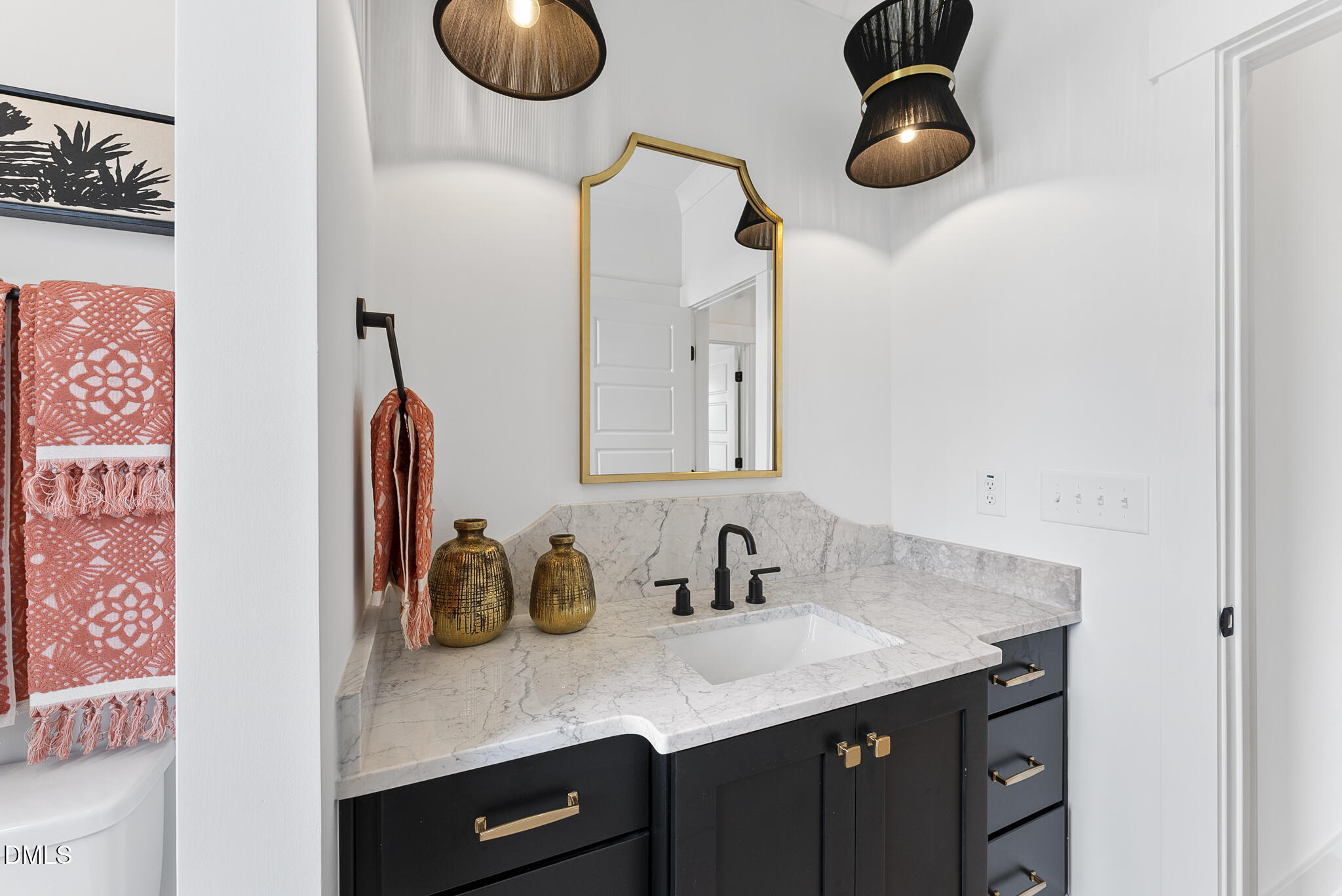 761 West Holly Springs Road Holly Springs, NC 27540 - Photo 19 of 61 a bathroom with a sink and a mirror