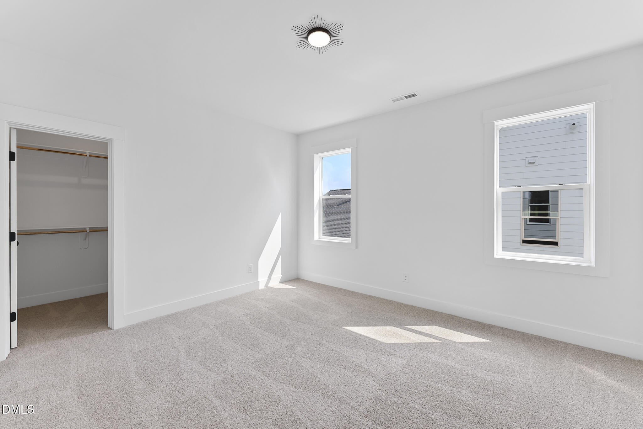 761 West Holly Springs Road Holly Springs, NC 27540 - Photo 41 of 61 a view of an empty room with a window