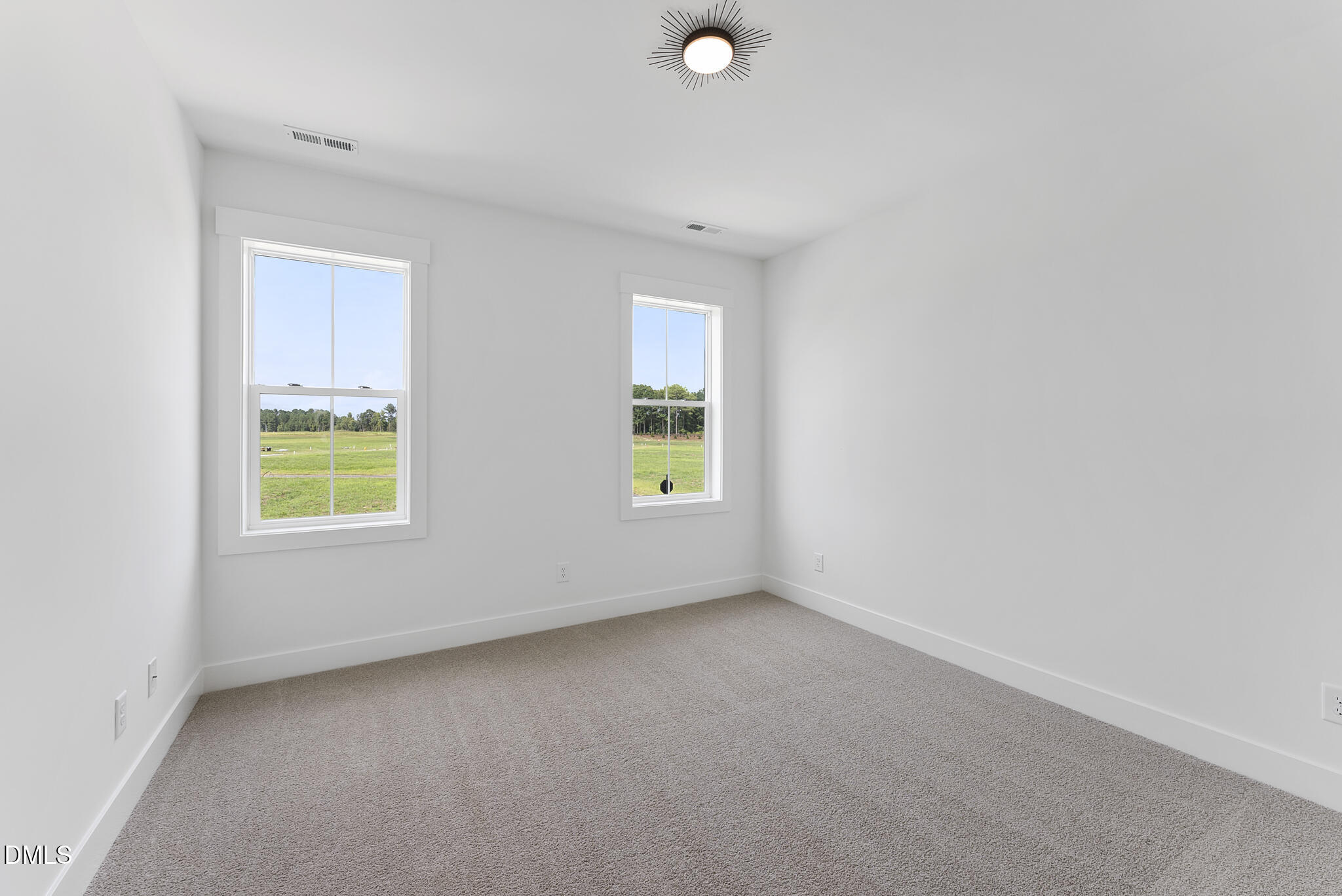 761 West Holly Springs Road Holly Springs, NC 27540 - Photo 44 of 61 an empty room with windows