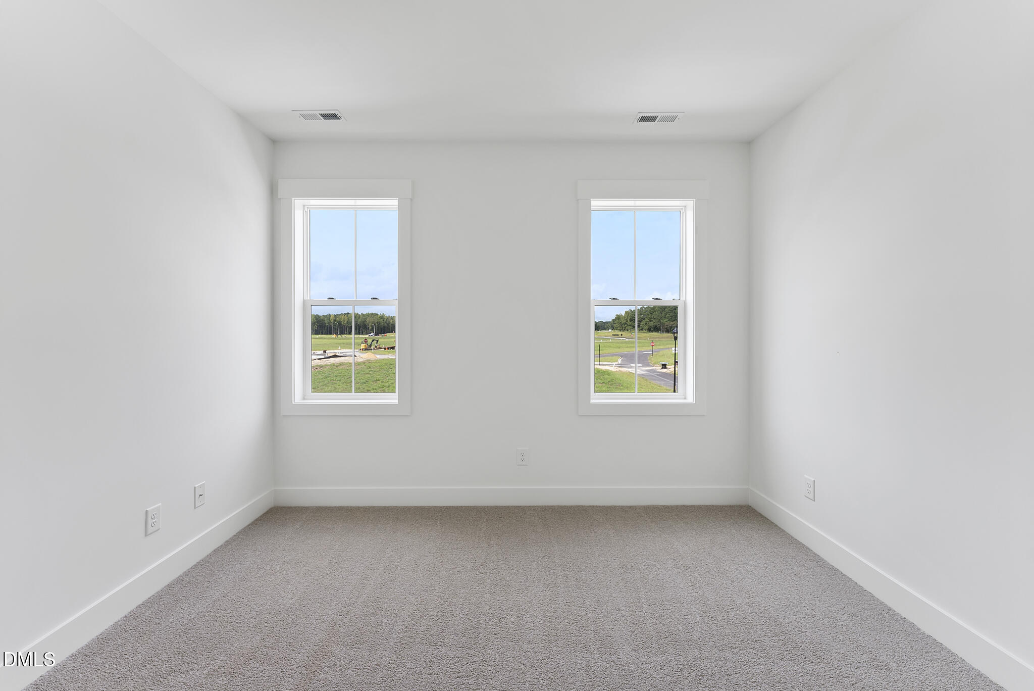 761 West Holly Springs Road Holly Springs, NC 27540 - Photo 45 of 61 an empty room with a window