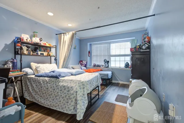 a bed room with a bed and a window