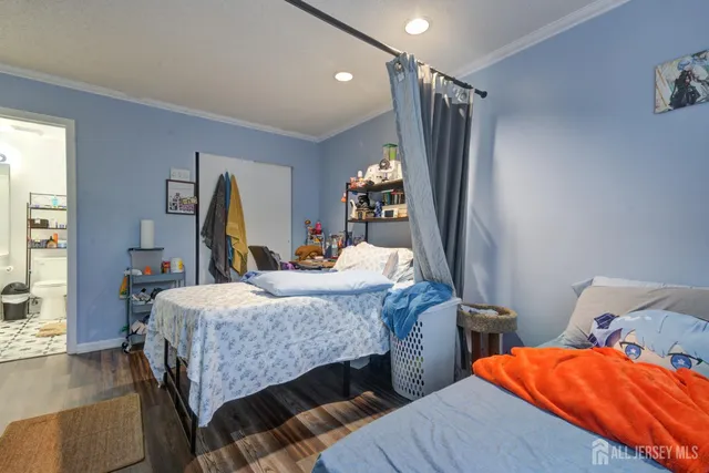 a bedroom with furniture and a bed