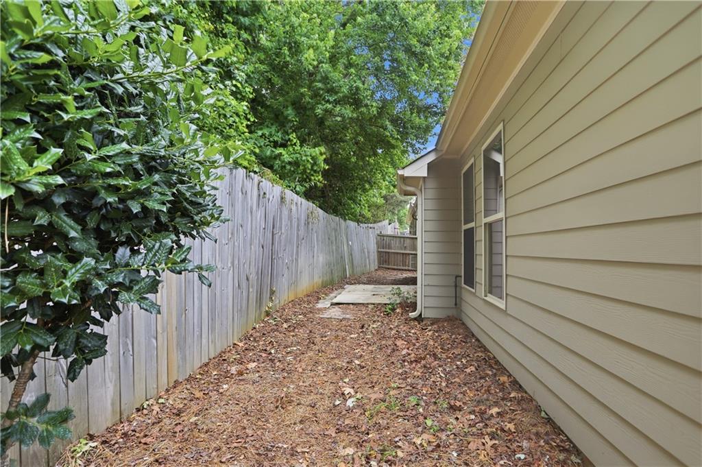 236 Manous Way Canton, GA 30115 - Photo 25 of 25 a backyard of a house with green space