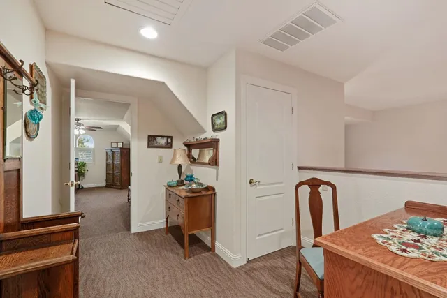 a bathroom with a sink a vanity and a mirror
