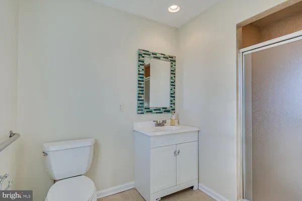 a bed room with a bed and a dresser