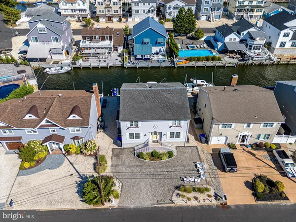 an aerial view of houses with outdoor space