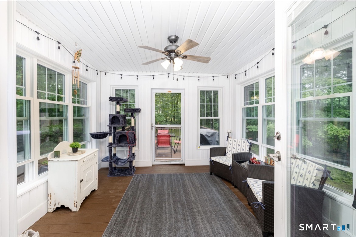35 Hunt Road Columbia, CT 06237 - Photo 13 of 38 Bautiful sun room with windows on all 3 sides.