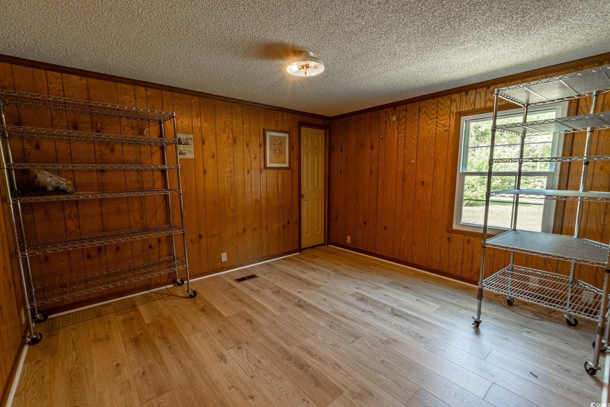 2150 Hazel Road Conway, SC 29526 - Photo 18 of 28 Interior space featuring wooden walls, crown moldi